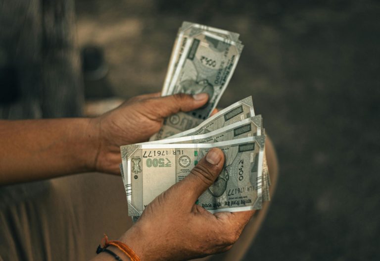 Man Counting Banknote