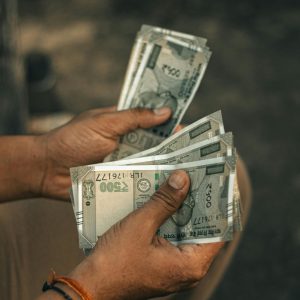 Man Counting Banknote